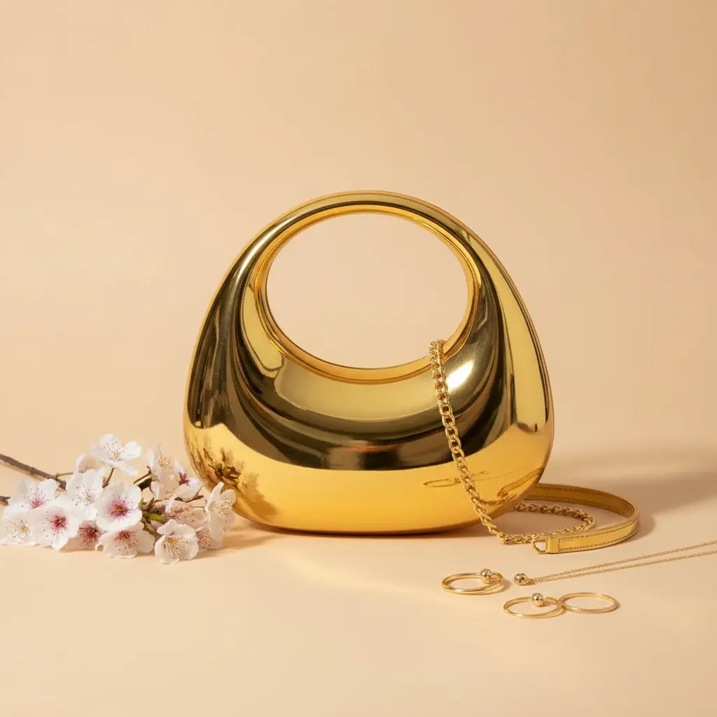 Aurora Metallic Moon Clutch – Golden | Removable Chain | Premium Party Wear Bag – Nayab Khatoon